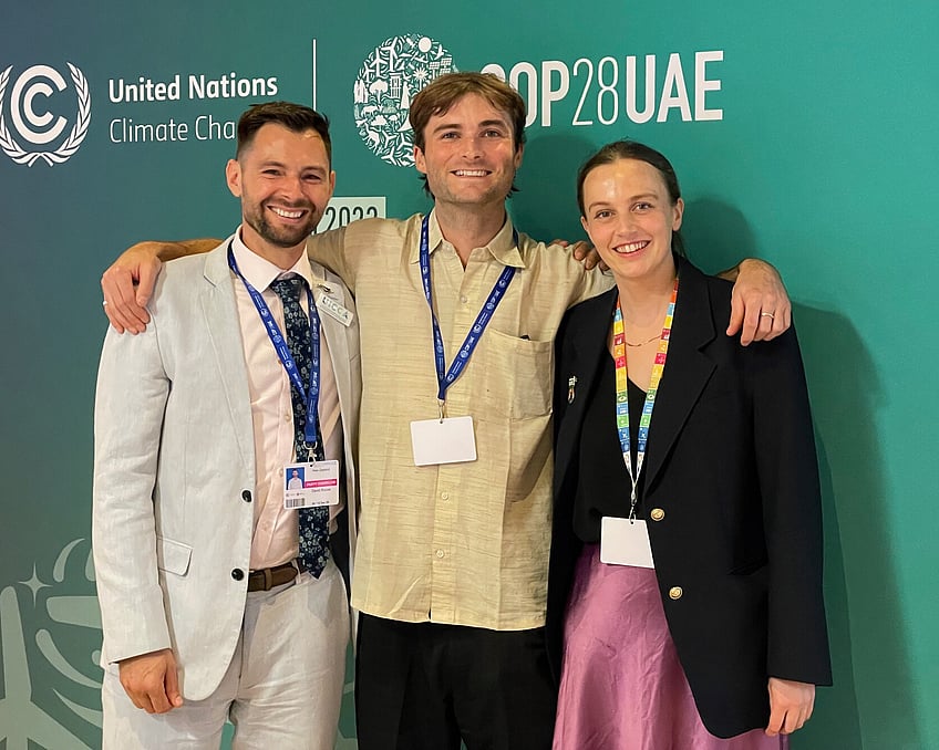 Three Kiwis in Climate members networking at COP28