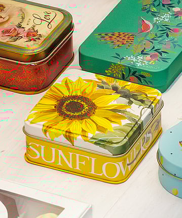 Traditional tin with printed yellow sunflower on the lid