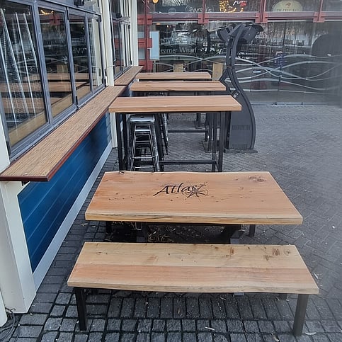 Outdoor seating for Atlas Bar & Kitchen Queenstown by Harwood Joinery.