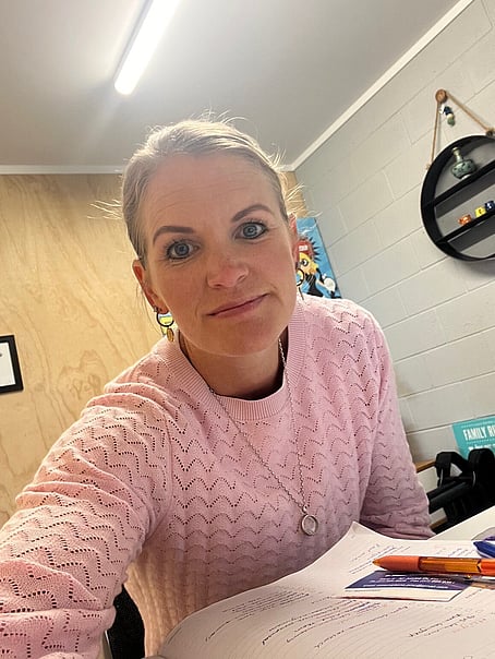Jacqui Gage-Brown reviewing her diary — the planning habit that keeps marketing moving when everything else is competing for attention