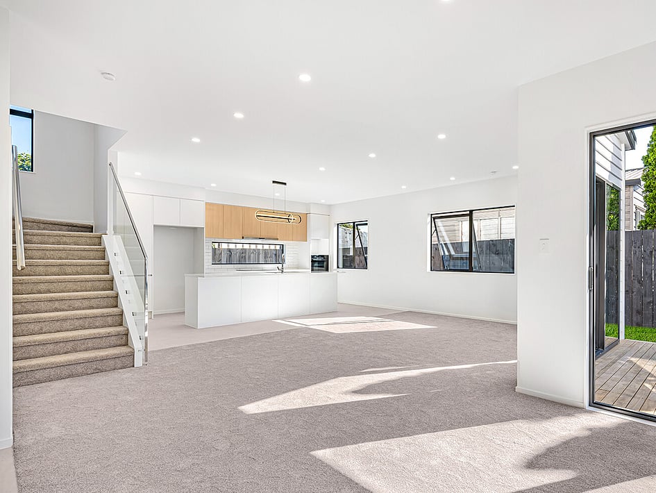 Living and kitchen view of Eden Construction’s new build house on Mountain Road, Mangere Bridge, Auckland.