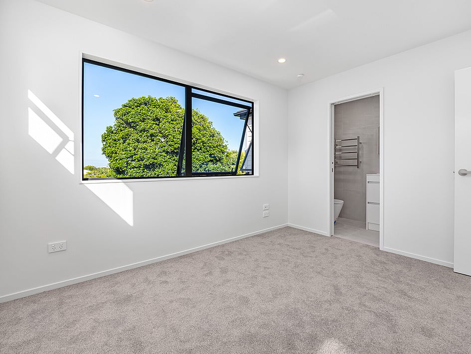 New neutral bedroom in Eden Construction’s new build house on Mountain Road, Mangere Bridge, Auckland.