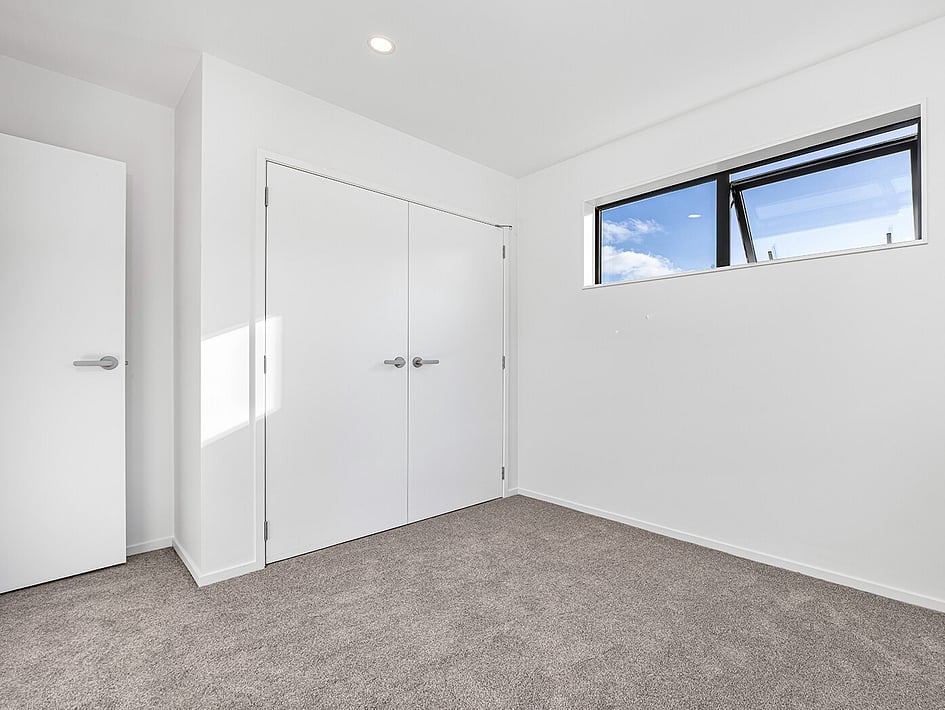 New neutral bedroom in Eden Construction’s new build house on Mountain Road, Mangere Bridge, Auckland.