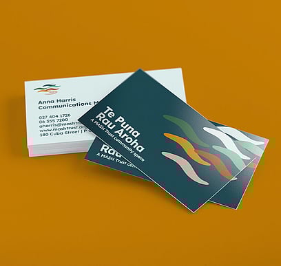 Te Puna Rau Aroha business cards on orange