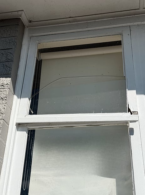 Timber joinery with broken glass