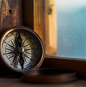 Compass representing focused governance direction, highlighting GGA's commitment to guiding better board performance through the merger of Westlake Governance and Peakstone Global