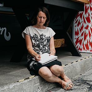 Owner and Graphic Designer Rose Wells
