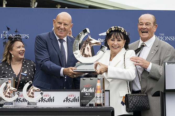 Sir Brendan Lindsay (right) and Lady Jo Lindsay pictured accepting the trophy following Joliestar's victory in the Gr.1 T J Smith Stakes (1200m). -  Photo: Bradleyphotos.com.au