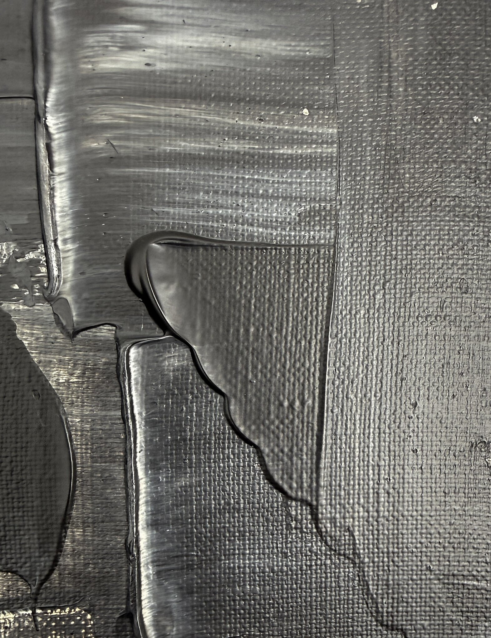 detail image showing satin-like surface with smooth drag marks ending in impasto ridges and pooled paint edges 
