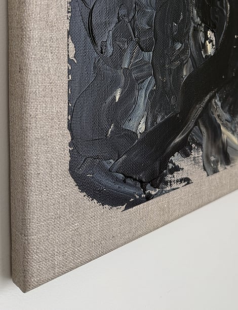 black and pale cream acrylic on linen, impasto buildup at edge over raw linen, dragged paint marks, matte field, exposed weave