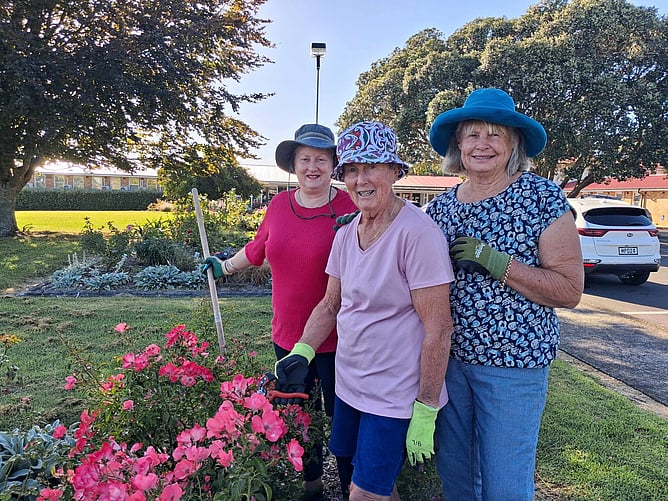 From left: Cherie Thom, Gaye Cooper, and Chris Futter hard at work outside Pukekohe Hospital. Times photo Helena O’Neill