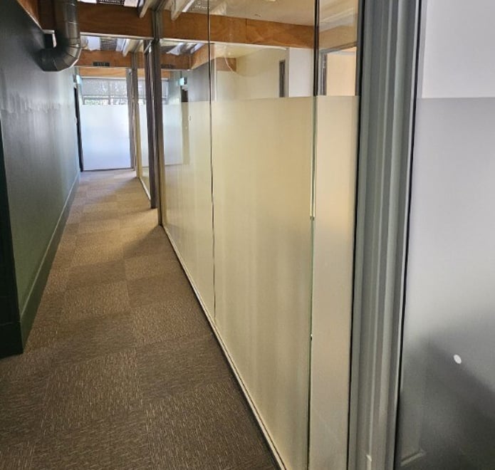 internal glass partitions for hallways in the workspace