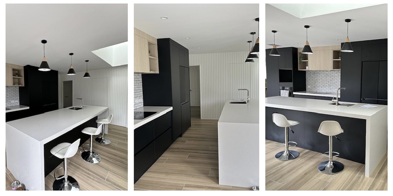 Wattle Downs Kitchen Renovation with black cabinetry and white stone island