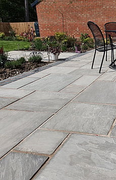 Natural sandstone with limestone cobble sets