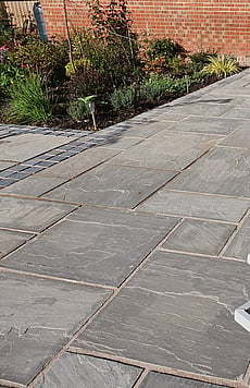 Natural sandstone with limestone cobble sets