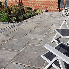 Natural sandstone with limestone cobble sets