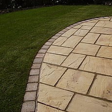 Heritage York stone with cobble edge