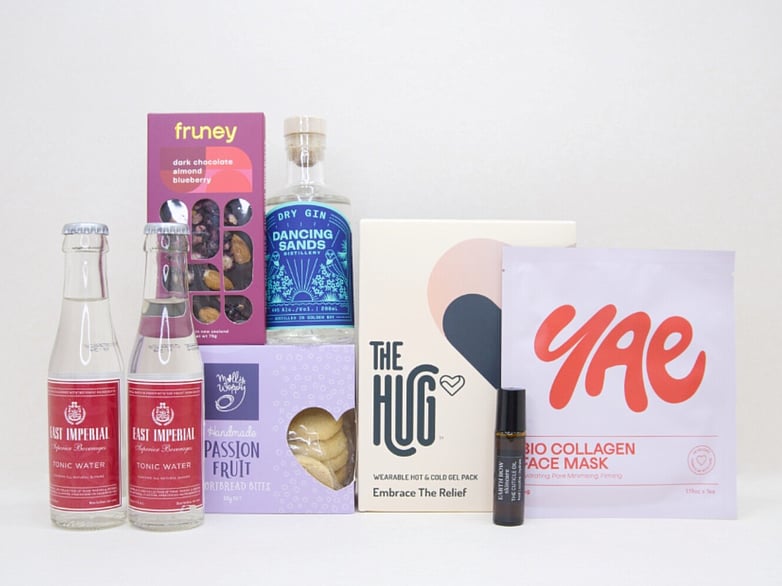 Evening Reset gift box NZ &mdash; NZ-made relaxation gift box with Dancing Sands gin, The Hug gel pack, Fruney chocolate and YAE face mask