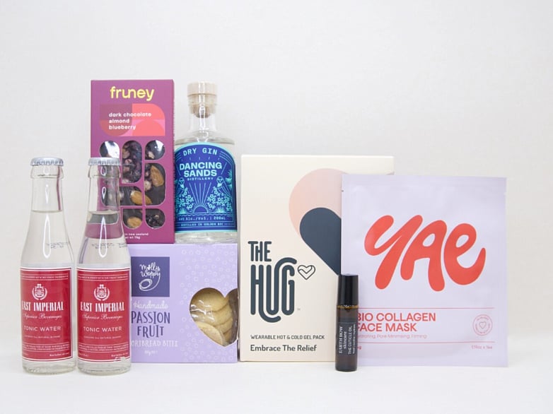 Evening Reset gift box NZ — NZ-made relaxation gift box with Dancing Sands gin, The Hug gel pack, Fruney chocolate and YAE face mask