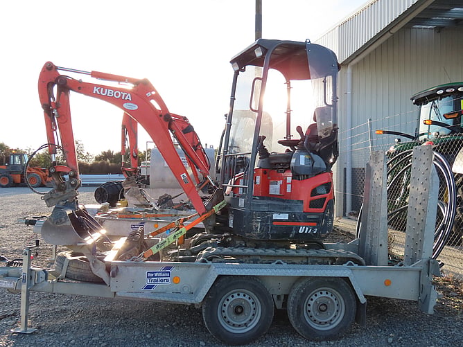 digger on trailer