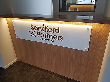 Glass sign for Reception counter, this has been vinyl wrapped by a local sign writer