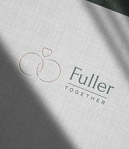 Editorial style image showcasing a business card design for Fuller Together, a wedding planner | Brand designer for wedding professionals