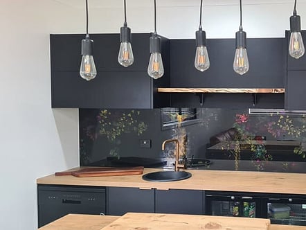 Tamaasa Art with Matt Black Over Panels splashback