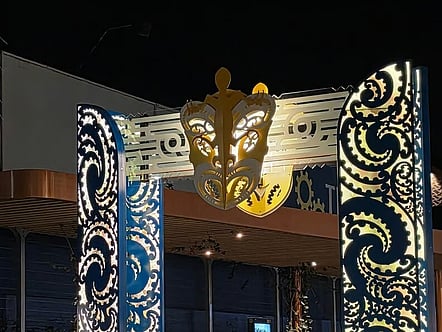 Te Manawataki o Te Papa at night with lights lit