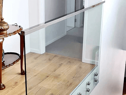 50mm stainless double disc standoffs. 12mm toughened glass and stainless top cap handrail