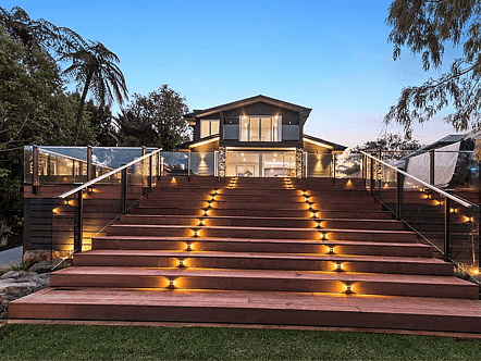 Face fixed post system balustrade with interlinking handrail - black finish