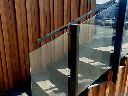 Commercial external staircase portion of post system balustrade with interlinking handrail - black finish