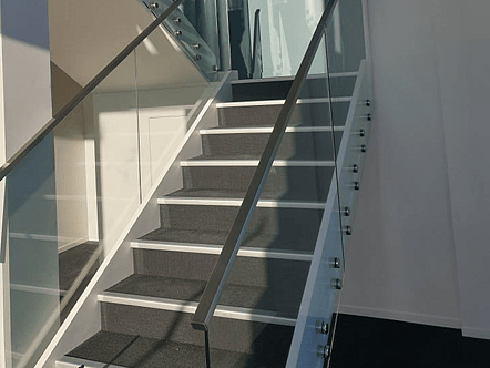 Commercial external staircase portion of post system balustrade with interlinking handrail - black finish