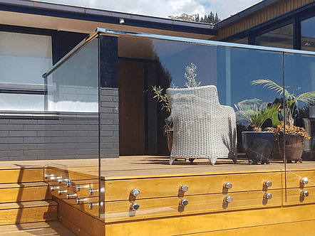 50mm stainless double disc standoffs, 12mm toughened glass and polished top cap handrail