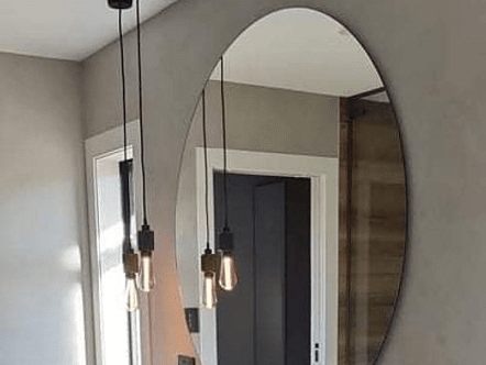 1250 circle polished mirror on backing board to give floating look