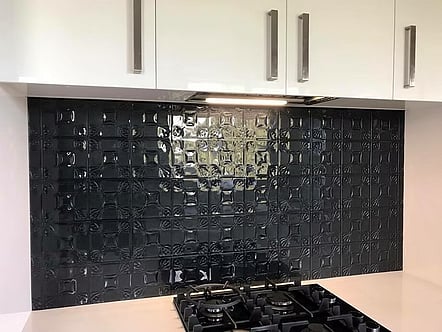 Black pressed tin pattern splashback