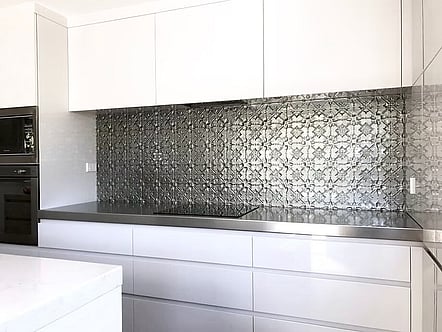 Silver pressed tin pattern splashback