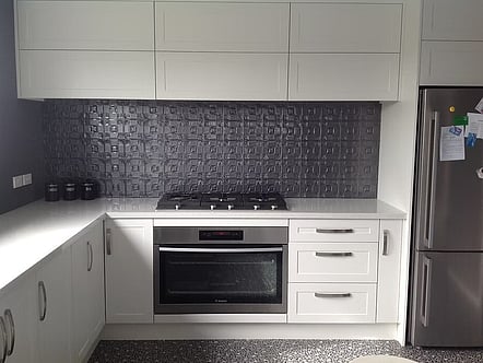 Silver pressed tin splashback