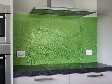 Lime green fern pattern splashback