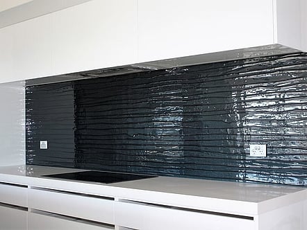Charcoal raked sand pattern splashback