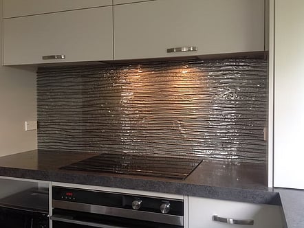 Brown raked sand pattern splashback