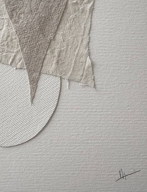 close-up image of ivory fabriano surface texture, linen fragments with soft frayed linen edges, one rounded ivory fabriano paper shape and handwritten signature in lower right corner