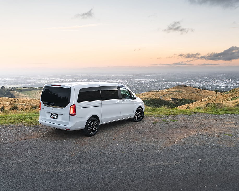 Mercedes V220d side profile at sunset on rural road