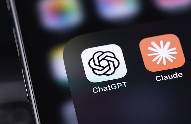 Close up of iphone screen with icon for ChatGPT & Claude: large-language model apps