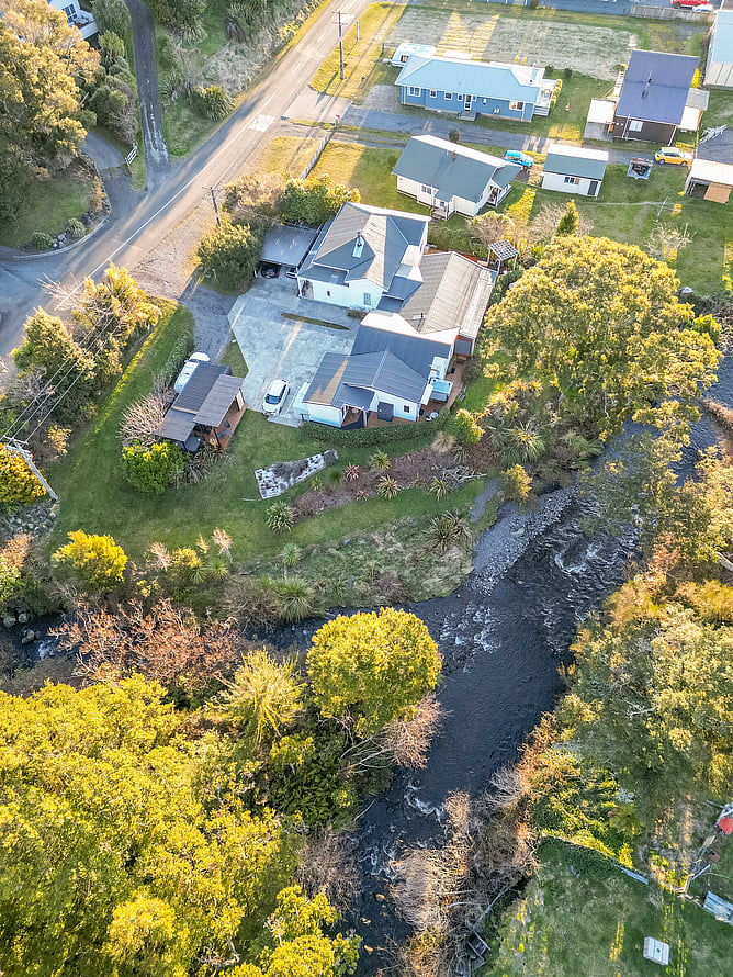 An aerial view of Two Rivers Ohakune.  The guest suites are at the river end of the property.