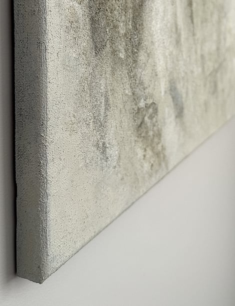 side view of tonal layered painting showing canvas depth, exposed underlayers and raised mineral-based surface with textured detail in background