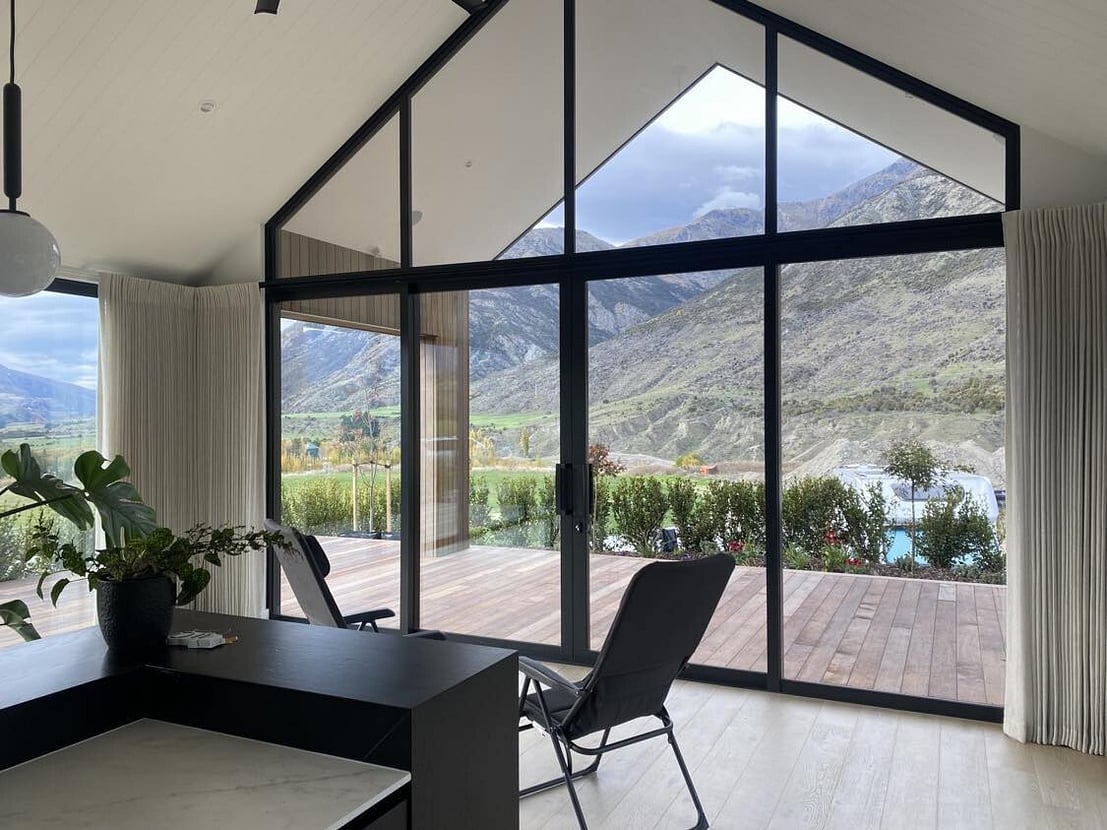 Sheers dressing a window overlooking a view in Bay of Plenty