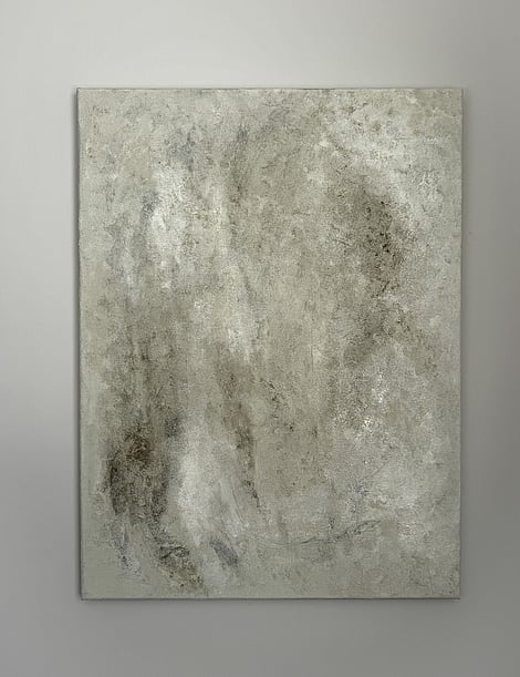 full image of weathered tonal abstract painting showing layered mineral-based texture, pockets of charcoal underlayer and mottled surface movement in muted green, pale cream and white