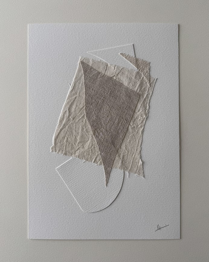 full image of layered collage with beige-toned linen fragments on soft white fabriano, with two hand-cut soft white fabriano paper shapes and handwritten signature in lower right corner