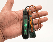 New Zealand Aotearoa Pounamu greenstone with Paua shell inlay into the Pounamu this is a necklace handcrafted by Dot Arts Pounamu and Paua shell also known as abalone source from the South Island of New Zealand