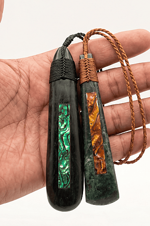 New Zealand Aotearoa Pounamu greenstone with Paua shell inlay into the Pounamu this is a necklace handcrafted by Dot Arts Pounamu and Paua shell also known as abalone source from the South Island of New Zealand